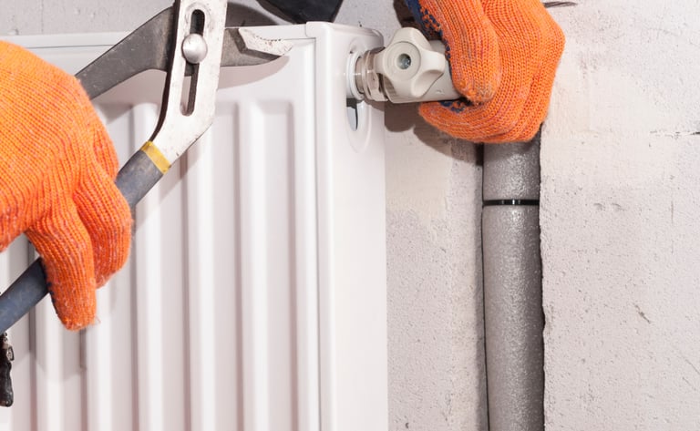 Installation de radiateur avec Karukera Plomberie pour un chauffage efficace."