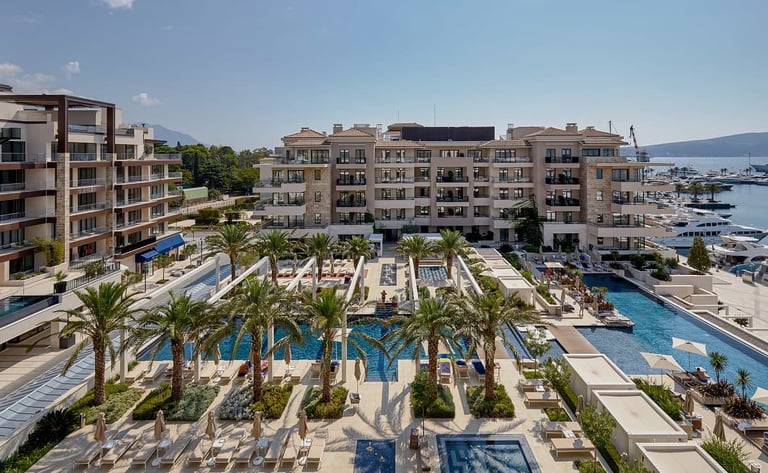 Aqua and Elena building and swimming pools in Porto Montenegro marina