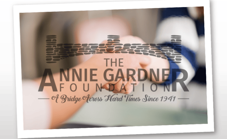 annie gardener foundation logo over holding hands