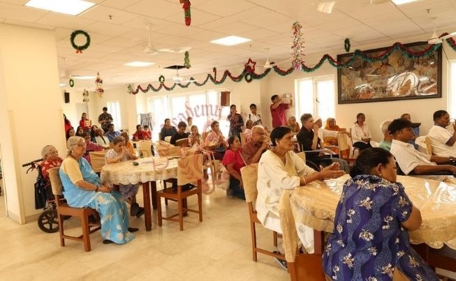 Residents enjoying a musical performance by The Academy of Music