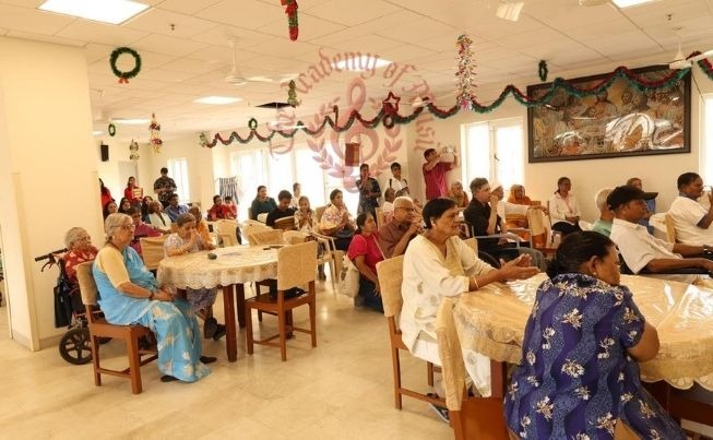 Residents enjoying a musical performance by The Academy of Music