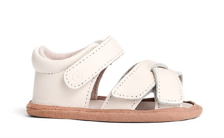 Product photography - a white baby's leather sandal with a strap