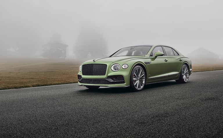 a green bentley flying spur