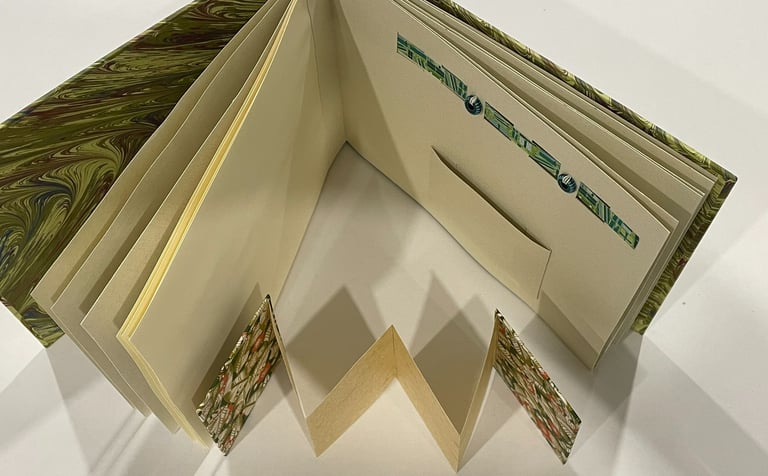 Album with marbled paper and decorative pages