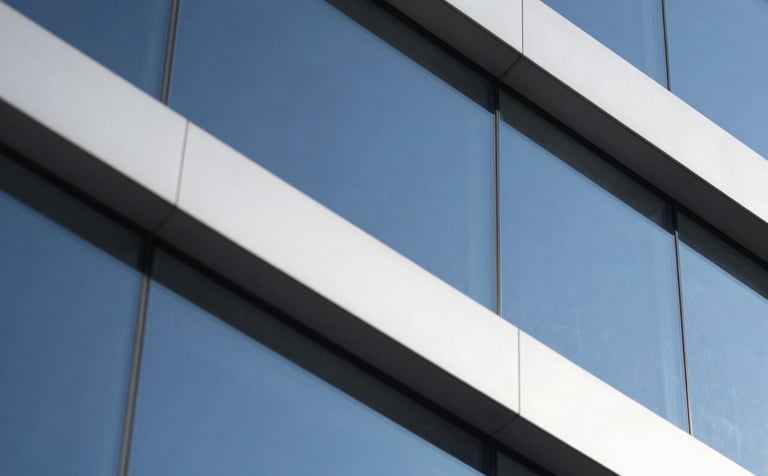 Abstract close-up of geometric architectural shapes and glass panels reflecting a deep blue sky. Sharp edges, clear lines, and a sense of orderly structure. High-end and technical feel. Colors used: #2D5D6D, #F5F5F5, #1A1A1A.
