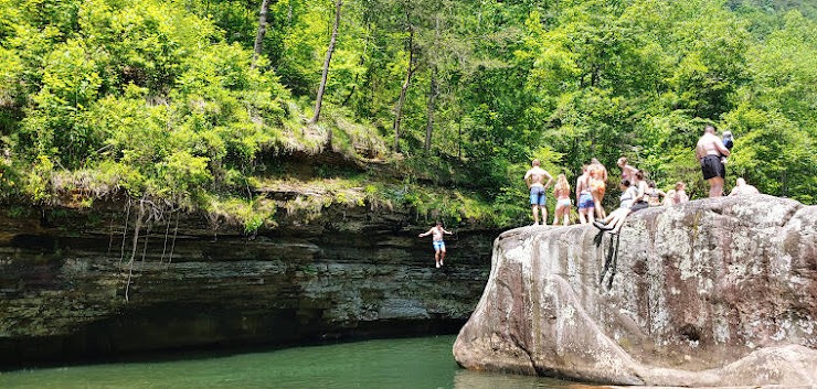 Soddy Daisy, TN - People jumping off a cliff & huge boulder at the Soddy Blue Hole