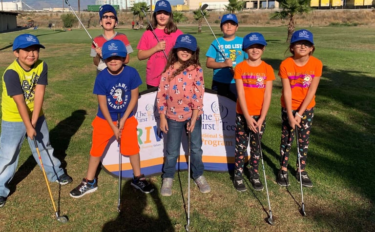 Enhancing Forward Action Inc. image of a  group of children golfers posing