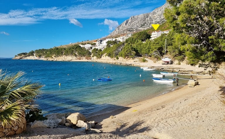 Lokva Rogoznica bay with lush greenery and clear Adriatic water, Croatia
