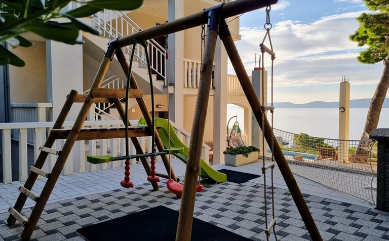 The photo shows the children's swing.