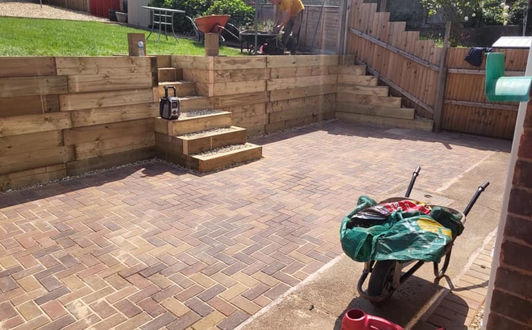 Garden steps leading to patio in Worcester home