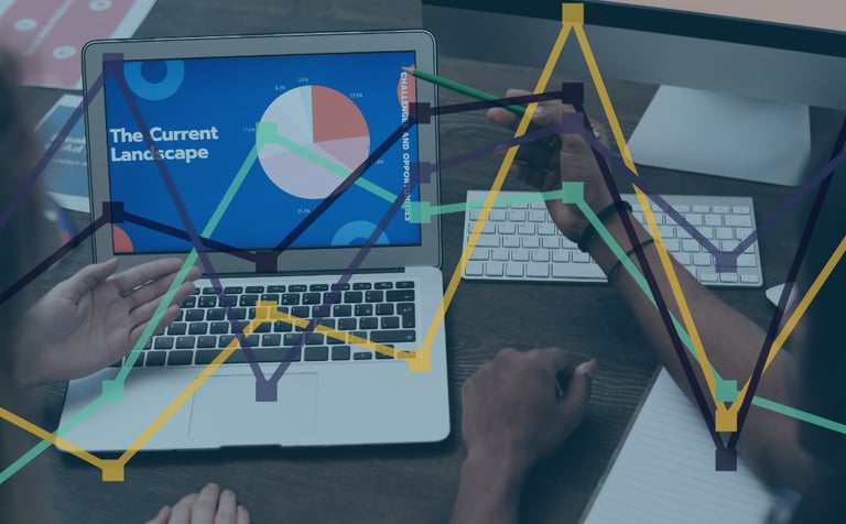 A graph over a laptop to symbolise AI in Ecommerce