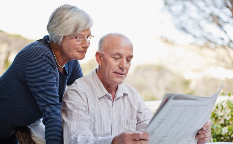 OLDER COUPLE DOING ESTATE PLANNING