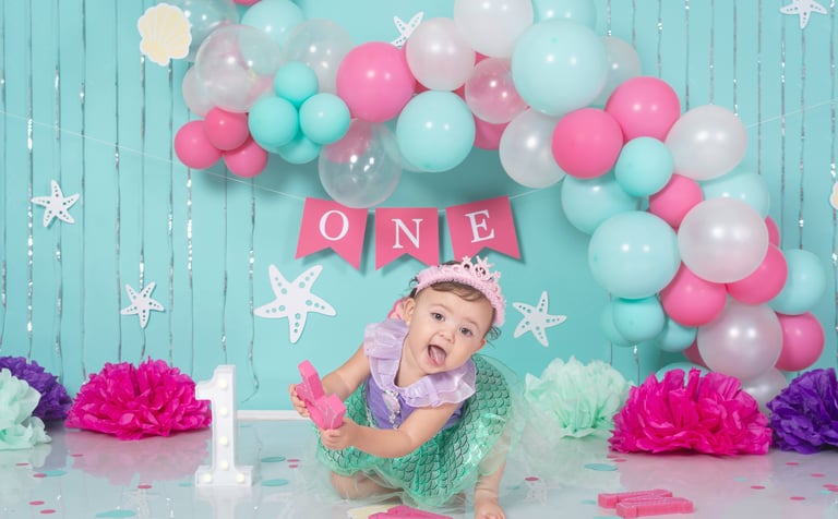a baby boy in a space themed photo shoot