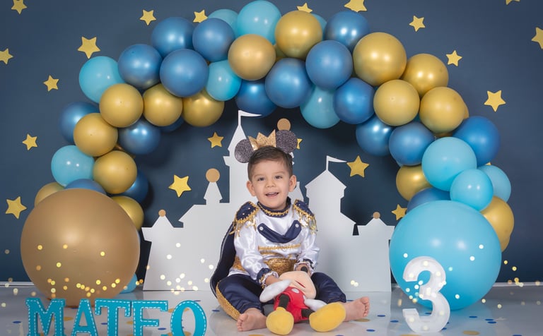 a baby boy in a mickey mouse costume