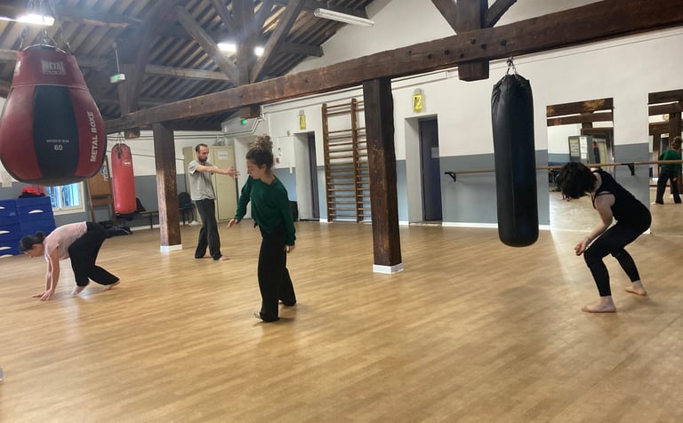 a group of people in a danse room