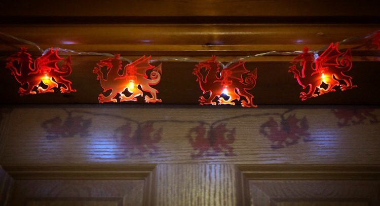 Red dragon lights projecting red dragon shadows behind