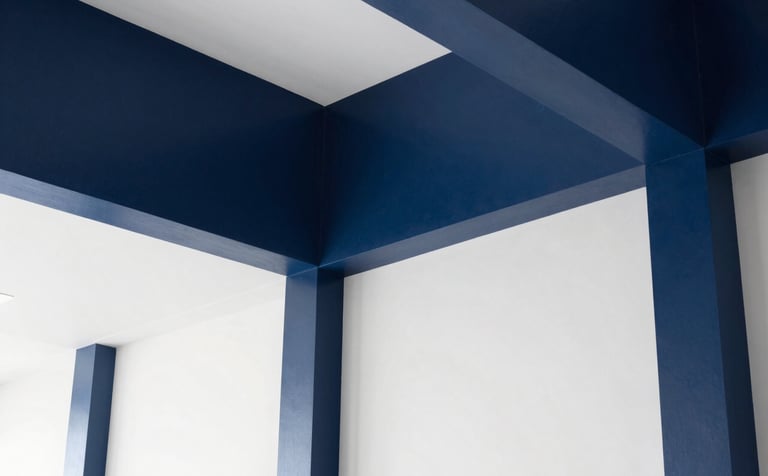Clean, minimalist corporate interior architecture in a South American business setting. The scene features a high-contrast environment with navy blue architectural details and bright white walls, symbolizing stability and professional precision.