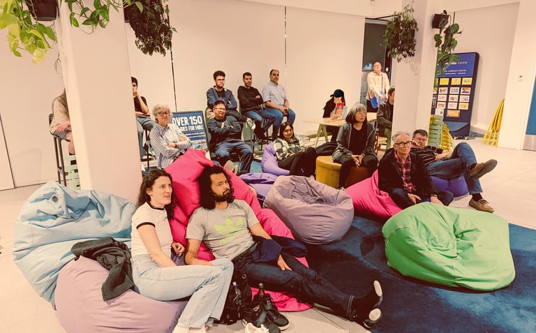 Attendees participating in a post-screening discussion at Auckland International Film Club event.