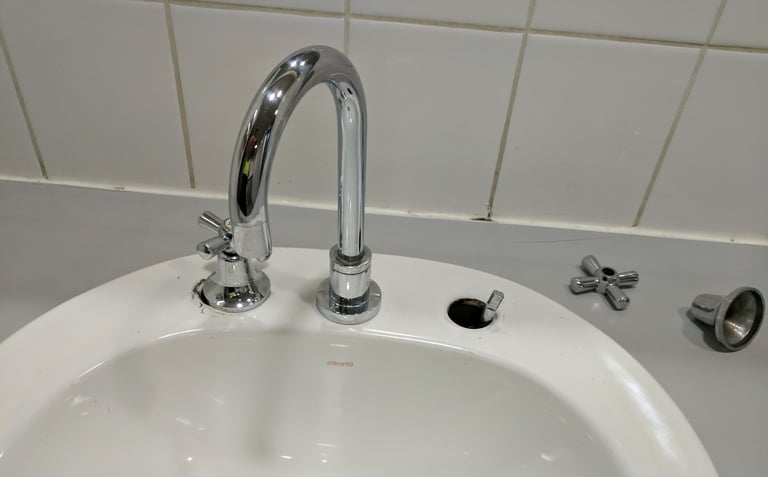 broken basin mixer tap