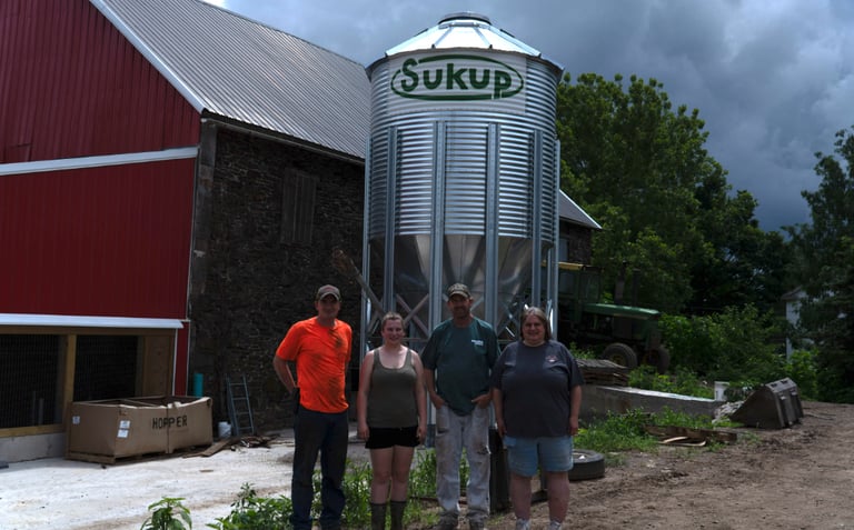 The Worthington Family with the Sukup grain bin