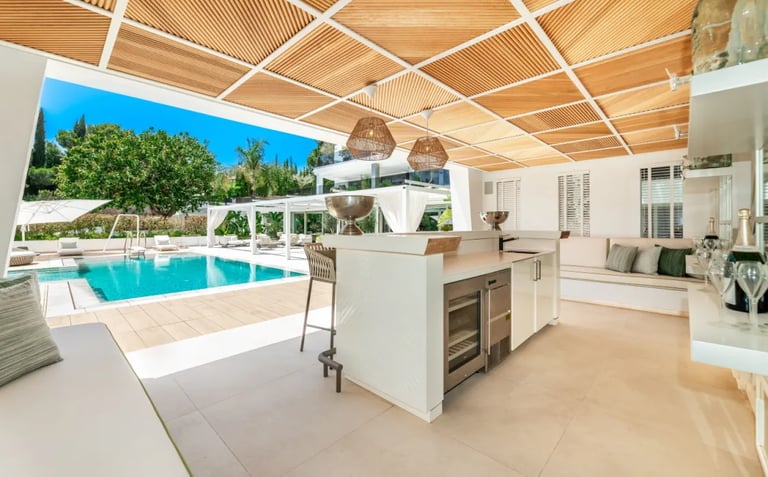 Villa Serenity pool bar with modern white canopy roof