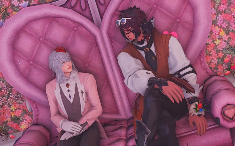 Themis and a client sitting on a heart shaped lounge