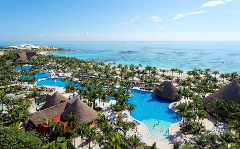 5-star all-inclusive Barceló Maya Colonial resort in Mexico, featuring white sandy beach