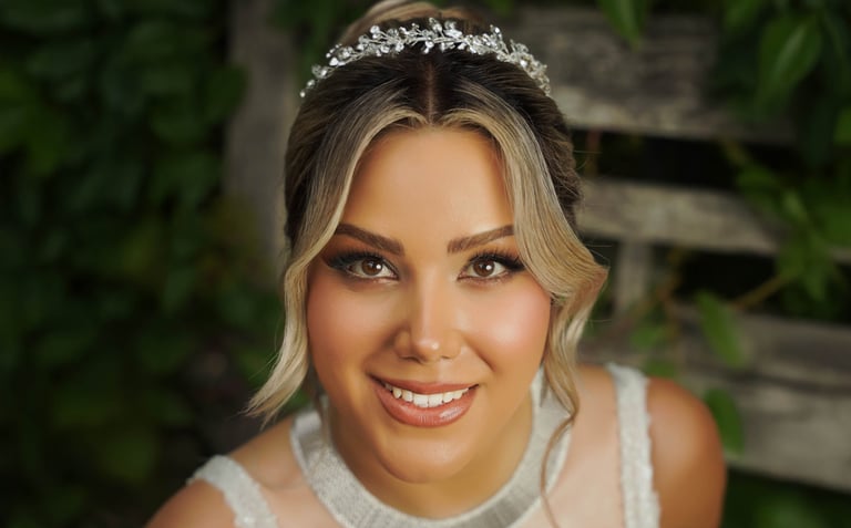 Close-up bridal portrait with natural makeup and tiara, captured by Fred Art Studio