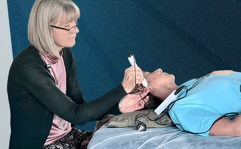 a woman is shown in this picture, practicing healing techniques at the Circle of Chi wellness Center