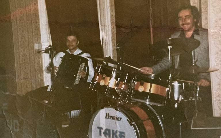 Jon Yon playing and singing. Pictured with his drummer Phil Goldsmith, playing as the band Take Two.