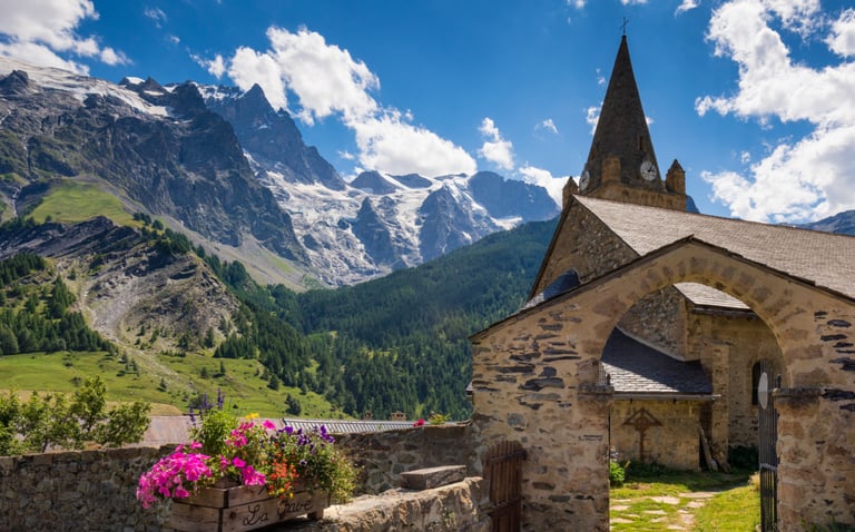 Alps France village church mountains snow blue sky