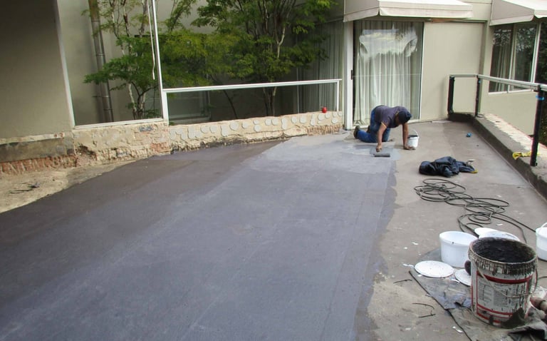 Precision waterproofing membrane application to for a perfect seal for balcony slab, Fourways Gardens, Sandton