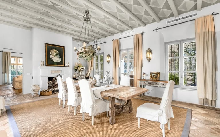 Elegant dining room with rustic beams at Finca Santa Katerina
