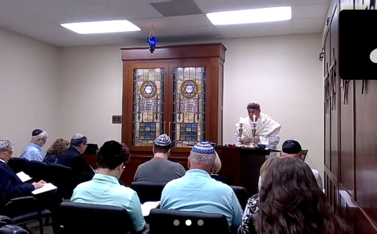 Rabbi Rudnick leading services