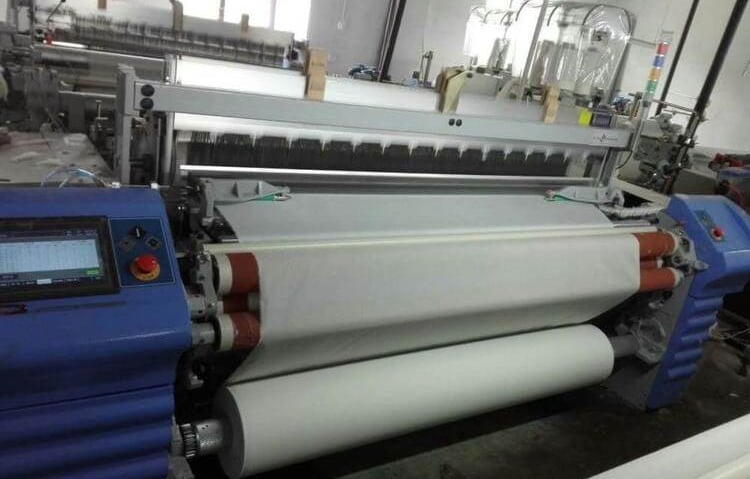 a machine that is making a paper towel