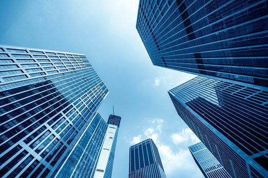 "Modern office buildings interconnected, representing seamless networking solutions for businesses."
