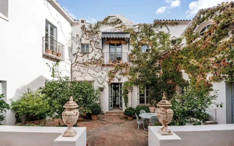 Finca Santa Katerina main courtyard with statues and balconies