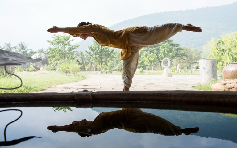 a women doing yoga called angamardana