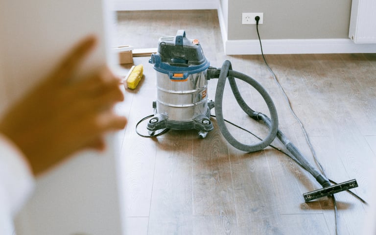 Professional post-construction cleaning service for dust and debris removal in a new home