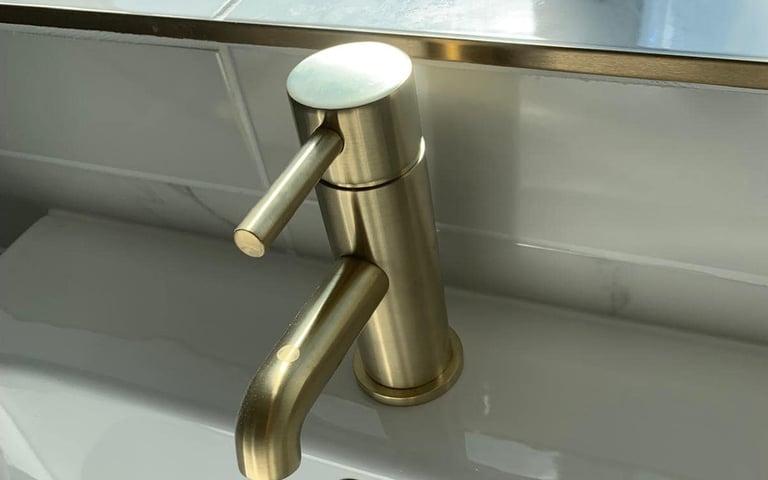 Bathroom taps showing stronger pressure following booster pump installation in Droitwich