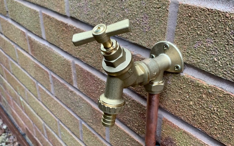 Outdoor tap installed for a customer by AXM Plumbing Services in Droitwich