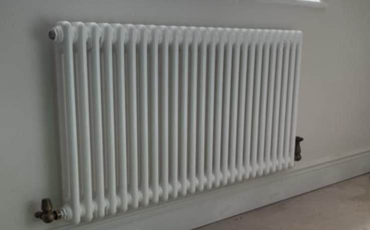 Heated towel rail fitting in Pershore bathroom by PBP Services heating specialists