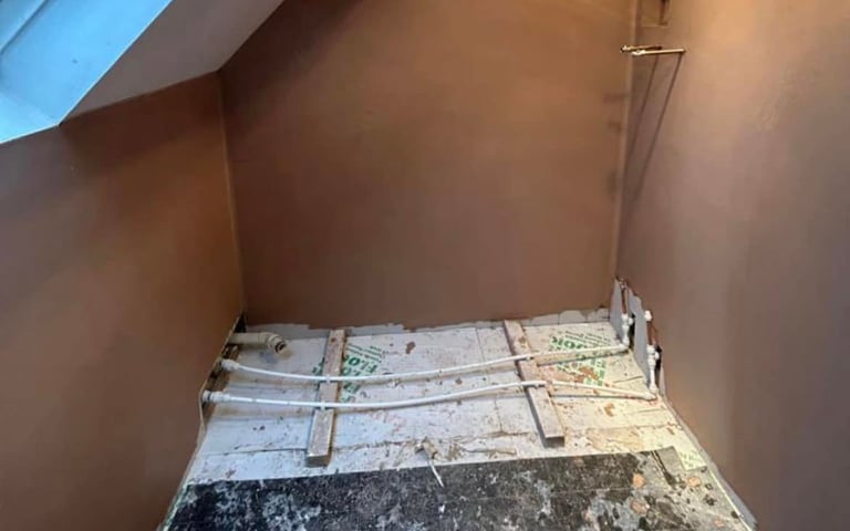 Bathroom plumbing installation during first fix stage by AXM Plumbing Services in Worcester