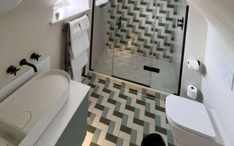 Modern walk-in shower installation with tiled walls by PBP Services in Worcestershire