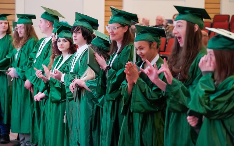 Excel Center Graduation, Graduates in caps and gowns