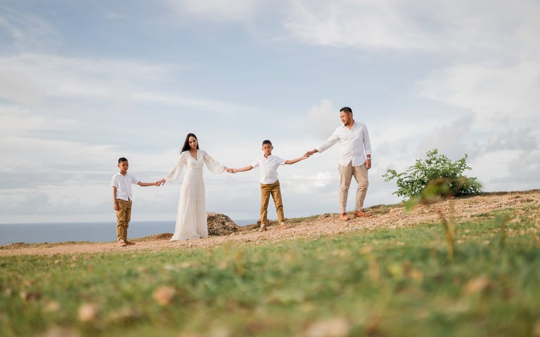 Timeless family photography moment of Ayunda family at Melasti Beach Bali.