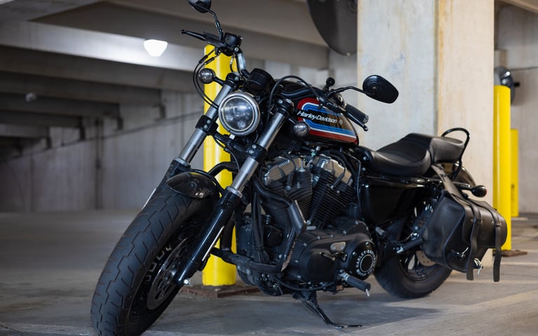Harley Davison motorcycle parked in a parking garage