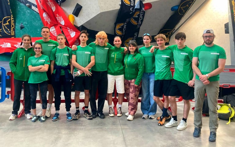 a group of people in green shirts 