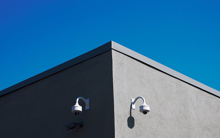two cameras on a building