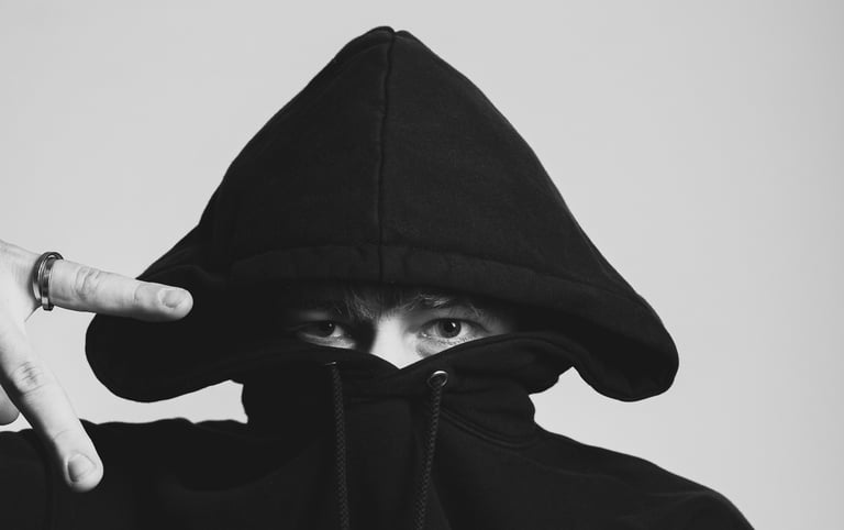portrait of a man in a black hoodie with a hoodie on